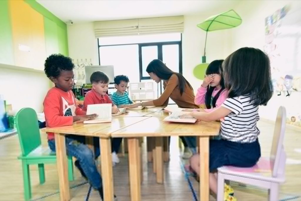 Children around a table in a child care center
