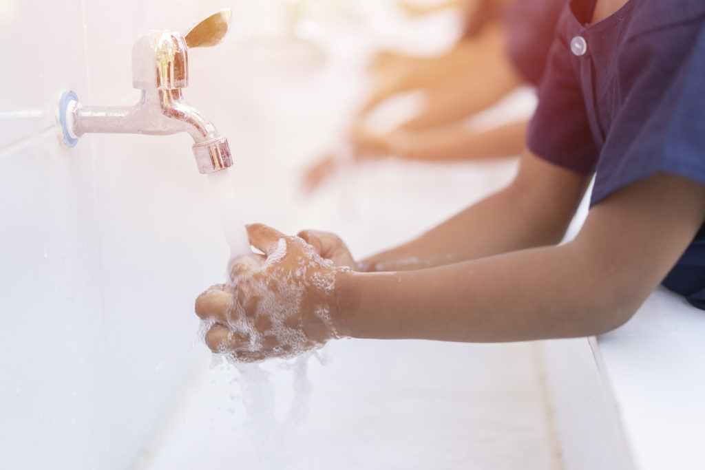 close-up-hands-of-children-or-pupils-at-preschool-washing-hands-with-soap-under-the-faucet-with-watercopy-space-for-text-or-product-you-clean-and-hygiene-concept