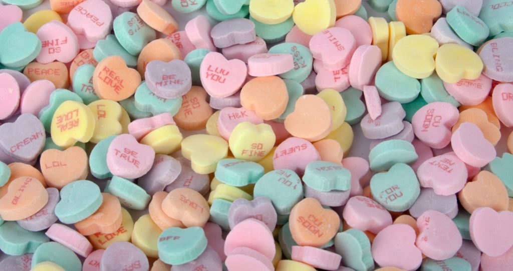 Candy hearts can be dissolved in an activity to teach science.