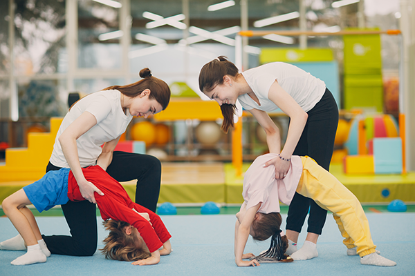 Preschoolers take part in gymnastics class.