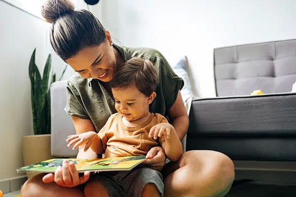 Teacher reads to a toddler