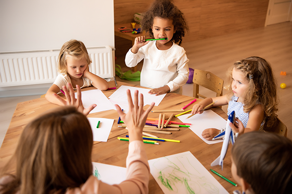 Preschool children practice counting.